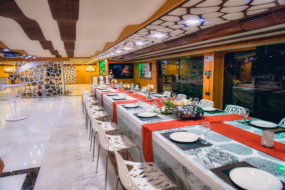 Lower Deck dining arrangement on Lotus Mega Yacht