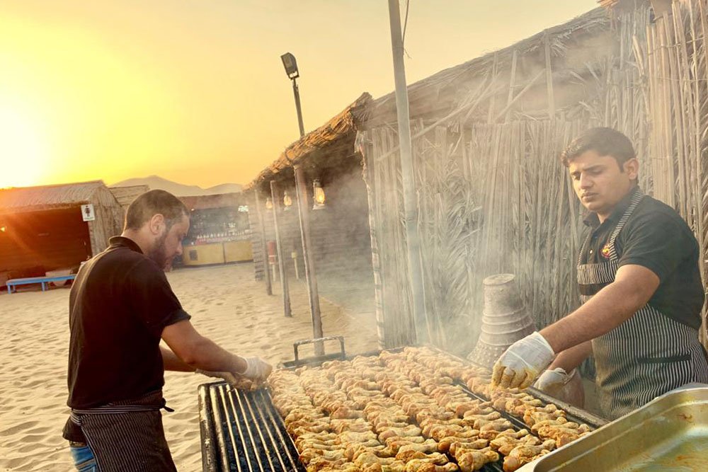 BBQ dinner is served during Dubai's New Year Drive the Thrill Camp
